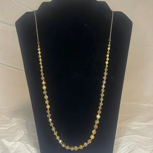Carved stone and bead necklace